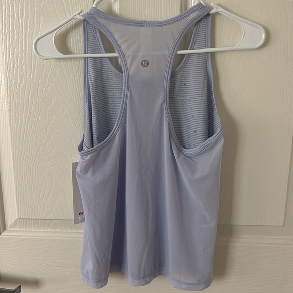NWT Lululemon swiftly tank top
Size 4
Lavender purple - Picture 4 of 4